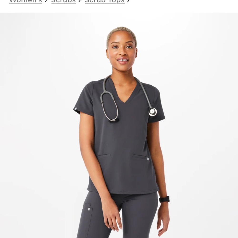 Figs Gray scrub top with two pockets on the front
